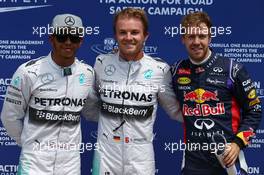 pole for Nico Rosberg (GER) Mercedes AMG F1, 2nd for Lewis Hamilton (GBR) Mercedes AMG F1 W05 and 3rd for Sebastian Vettel (GER) Red Bull Racing. 07.06.2014. Formula 1 World Championship, Rd 7, Canadian Grand Prix, Montreal, Canada, Qualifying Day.