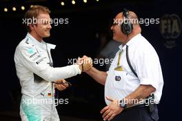 (L to R): Nico Rosberg (GER) Mercedes AMG F1 celebrates his pole position with Pat Behar (FRA) FIA. 07.06.2014. Formula 1 World Championship, Rd 7, Canadian Grand Prix, Montreal, Canada, Qualifying Day.