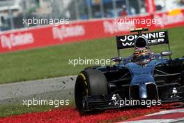 Kevin Magnussen (DEN) McLaren MP4-29 spins. 07.06.2014. Formula 1 World Championship, Rd 7, Canadian Grand Prix, Montreal, Canada, Qualifying Day.