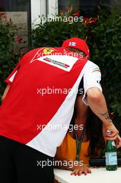 Kimi Raikkonen (FIN) Ferrari with his girlfriend Minttu Virtanen (FIN). 07.06.2014. Formula 1 World Championship, Rd 7, Canadian Grand Prix, Montreal, Canada, Qualifying Day.