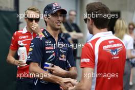 (L to R): Daniel Ricciardo (AUS) Red Bull Racing with Jules Bianchi (FRA) Marussia F1 Team on the drivers parade. 08.06.2014. Formula 1 World Championship, Rd 7, Canadian Grand Prix, Montreal, Canada, Race Day.