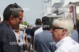 (L to R): Guenther Steiner (ITA) Haas F1 Team Prinicipal with Herbie Blash (GBR) FIA Delegate. 08.06.2014. Formula 1 World Championship, Rd 7, Canadian Grand Prix, Montreal, Canada, Race Day.