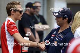 (L to R): Max Chilton (GBR) Marussia F1 Team with Daniel Ricciardo (AUS) Red Bull Racing on the drivers parade. 08.06.2014. Formula 1 World Championship, Rd 7, Canadian Grand Prix, Montreal, Canada, Race Day.