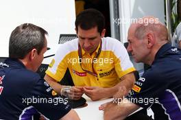 Remi Taffin (FRA) Renault Sport F1 Head of Track Operations (Centre) and Adrian Newey (GBR) Red Bull Racing Chief Technical Officer (Right). 08.06.2014. Formula 1 World Championship, Rd 7, Canadian Grand Prix, Montreal, Canada, Race Day.