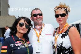 (L to R): Fabiana Valenti (ITA) Scuderia Toro Rosso Press Officer with Paul Stoddart (AUS) and Belinda (GBR). 08.06.2014. Formula 1 World Championship, Rd 7, Canadian Grand Prix, Montreal, Canada, Race Day.