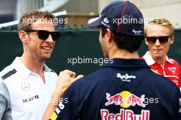 (L to R): Jenson Button (GBR) McLaren with Daniel Ricciardo (AUS) Red Bull Racing on the drivers parade. 08.06.2014. Formula 1 World Championship, Rd 7, Canadian Grand Prix, Montreal, Canada, Race Day.