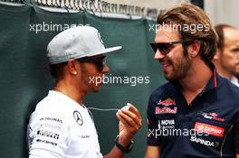 (L to R): Lewis Hamilton (GBR) Mercedes AMG F1 with Jean-Eric Vergne (FRA) Scuderia Toro Rosso on the drivers parade. 08.06.2014. Formula 1 World Championship, Rd 7, Canadian Grand Prix, Montreal, Canada, Race Day.