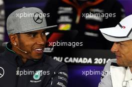 (L to R): Lewis Hamilton (GBR) Mercedes AMG F1 and Jenson Button (GBR) McLaren in the FIA Press Conference. 05.06.2014. Formula 1 World Championship, Rd 7, Canadian Grand Prix, Montreal, Canada, Preparation Day.