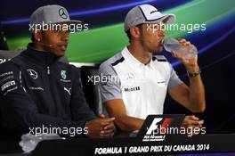 (L to R): Lewis Hamilton (GBR) Mercedes AMG F1 and Jenson Button (GBR) McLaren in the FIA Press Conference. 05.06.2014. Formula 1 World Championship, Rd 7, Canadian Grand Prix, Montreal, Canada, Preparation Day.