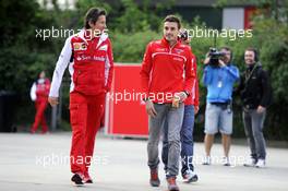 (L to R): Massimo Rivola (ITA) Ferrari Sporting Director with Jules Bianchi (FRA) Marussia F1 Team. 18.04.2014. Formula 1 World Championship, Rd 4, Chinese Grand Prix, Shanghai, China, Practice Day.