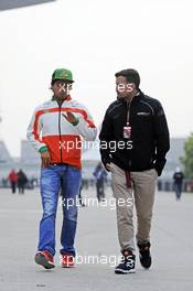 (L to R): Sergio Perez (MEX) Sahara Force India F1 with Will Buxton (GBR) NBS Sports Network TV Presenter. 18.04.2014. Formula 1 World Championship, Rd 4, Chinese Grand Prix, Shanghai, China, Practice Day.