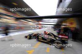 Romain Grosjean (FRA) Lotus F1 E22 leaves the pits. 18.04.2014. Formula 1 World Championship, Rd 4, Chinese Grand Prix, Shanghai, China, Practice Day.