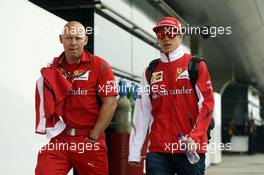 Kimi Raikkonen (FIN) Ferrari with Mark Arnall (GBR) Personal Trainer. 18.04.2014. Formula 1 World Championship, Rd 4, Chinese Grand Prix, Shanghai, China, Practice Day.