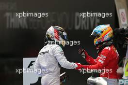 Lewis Hamilton (GBR), Mercedes AMG F1 Team and Fernando Alonso (ESP), Scuderia Ferrari  20.04.2014. Formula 1 World Championship, Rd 4, Chinese Grand Prix, Shanghai, China, Race Day.