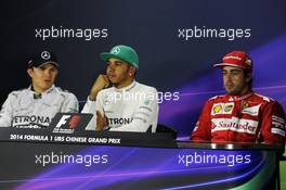 The FIA Press Conference (L to R): Nico Rosberg (GER) Mercedes AMG F1, second; Lewis Hamilton (GBR) Mercedes AMG F1, race winner; Fernando Alonso (ESP) Ferrari, third. 20.04.2014. Formula 1 World Championship, Rd 4, Chinese Grand Prix, Shanghai, China, Race Day.
