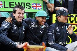 (L to R): Toto Wolff (GER) Mercedes AMG F1 Shareholder and Executive Director; race winner Lewis Hamilton (GBR) Mercedes AMG F1 and second placed Nico Rosberg (GER) Mercedes AMG F1 celebrate with the team. 20.04.2014. Formula 1 World Championship, Rd 4, Chinese Grand Prix, Shanghai, China, Race Day.