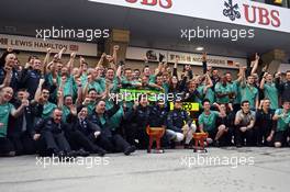 Race winner Lewis Hamilton (GBR) Mercedes AMG F1 celebrates team mate Nico Rosberg (GER) Mercedes AMG F1, Toto Wolff (GER) Mercedes AMG F1 Shareholder and Executive Director and the team. 20.04.2014. Formula 1 World Championship, Rd 4, Chinese Grand Prix, Shanghai, China, Race Day.