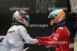 Lewis Hamilton (GBR), Mercedes AMG F1 Team and Fernando Alonso (ESP), Scuderia Ferrari  20.04.2014. Formula 1 World Championship, Rd 4, Chinese Grand Prix, Shanghai, China, Race Day.