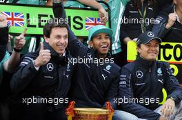 (L to R): Toto Wolff (GER) Mercedes AMG F1 Shareholder and Executive Director; race winner Lewis Hamilton (GBR) Mercedes AMG F1 and second placed Nico Rosberg (GER) Mercedes AMG F1 celebrate with the team. 20.04.2014. Formula 1 World Championship, Rd 4, Chinese Grand Prix, Shanghai, China, Race Day.