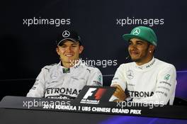 (L to R): Nico Rosberg (GER) Mercedes AMG F1 and team mate Lewis Hamilton (GBR) Mercedes AMG F1 in the FIA Press Conference. 20.04.2014. Formula 1 World Championship, Rd 4, Chinese Grand Prix, Shanghai, China, Race Day.