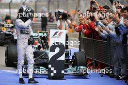 Nico Rosberg (GER) Mercedes AMG F1 W05 celebrates his second position in parc ferme. 20.04.2014. Formula 1 World Championship, Rd 4, Chinese Grand Prix, Shanghai, China, Race Day.