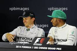 (L to R): Nico Rosberg (GER) Mercedes AMG F1 and team mate Lewis Hamilton (GBR) Mercedes AMG F1 in the FIA Press Conference. 20.04.2014. Formula 1 World Championship, Rd 4, Chinese Grand Prix, Shanghai, China, Race Day.