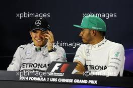 (L to R): Nico Rosberg (GER) Mercedes AMG F1 and team mate Lewis Hamilton (GBR) Mercedes AMG F1 in the FIA Press Conference. 20.04.2014. Formula 1 World Championship, Rd 4, Chinese Grand Prix, Shanghai, China, Race Day.