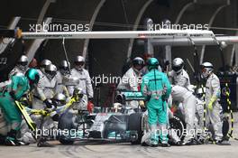 Lewis Hamilton (GBR) Mercedes AMG F1 W05 makes a pit stop. 20.04.2014. Formula 1 World Championship, Rd 4, Chinese Grand Prix, Shanghai, China, Race Day.