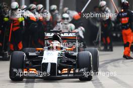 Nico Hulkenberg (GER) Sahara Force India F1 VJM07 makes a pit stop. 20.04.2014. Formula 1 World Championship, Rd 4, Chinese Grand Prix, Shanghai, China, Race Day.