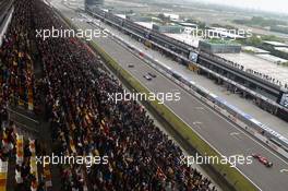 Valtteri Bottas (FIN) Williams FW36 and Romain Grosjean (FRA) Lotus F1 E22. 20.04.2014. Formula 1 World Championship, Rd 4, Chinese Grand Prix, Shanghai, China, Race Day.