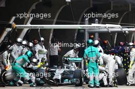 Nico Rosberg (GER) Mercedes AMG F1 W05 makes a pit stop. 20.04.2014. Formula 1 World Championship, Rd 4, Chinese Grand Prix, Shanghai, China, Race Day.