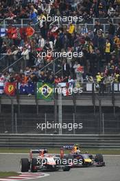 Jules Bianchi (FRA) Marussia F1 Team MR03 and Daniel Ricciardo (AUS) Red Bull Racing RB10. 20.04.2014. Formula 1 World Championship, Rd 4, Chinese Grand Prix, Shanghai, China, Race Day.