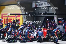 Daniil Kvyat (RUS) Scuderia Toro Rosso STR9 makes a pit stop. 20.04.2014. Formula 1 World Championship, Rd 4, Chinese Grand Prix, Shanghai, China, Race Day.