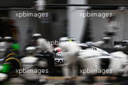 Kevin Magnussen (DEN) McLaren MP4-29 makes a pit stop. 20.04.2014. Formula 1 World Championship, Rd 4, Chinese Grand Prix, Shanghai, China, Race Day.