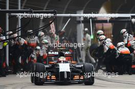 Sergio Perez (MEX) Sahara Force India F1 VJM07 makes a pit stop. 20.04.2014. Formula 1 World Championship, Rd 4, Chinese Grand Prix, Shanghai, China, Race Day.