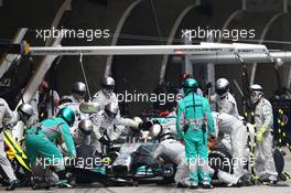 Lewis Hamilton (GBR) Mercedes AMG F1 W05 makes a pit stop. 20.04.2014. Formula 1 World Championship, Rd 4, Chinese Grand Prix, Shanghai, China, Race Day.