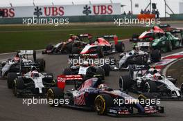 Daniil Kvyat (RUS) Scuderia Toro Rosso STR9 at the start of the race. 20.04.2014. Formula 1 World Championship, Rd 4, Chinese Grand Prix, Shanghai, China, Race Day.