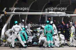 Nico Rosberg (GER) Mercedes AMG F1 W05 makes a pit stop. 20.04.2014. Formula 1 World Championship, Rd 4, Chinese Grand Prix, Shanghai, China, Race Day.