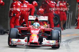 Fernando Alonso (ESP) Ferrari F14-T makes a pit stop. 20.04.2014. Formula 1 World Championship, Rd 4, Chinese Grand Prix, Shanghai, China, Race Day.