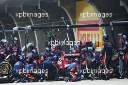 Jean-Eric Vergne (FRA) Scuderia Toro Rosso STR9 makes a pit stop. 20.04.2014. Formula 1 World Championship, Rd 4, Chinese Grand Prix, Shanghai, China, Race Day.