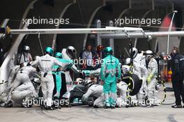 Lewis Hamilton (GBR) Mercedes AMG F1 W05 makes a pit stop. 20.04.2014. Formula 1 World Championship, Rd 4, Chinese Grand Prix, Shanghai, China, Race Day.