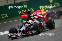 Daniil Kvyat (RUS) Scuderia Toro Rosso STR9 leads Daniel Ricciardo (AUS) Red Bull Racing RB10. 19.04.2014. Formula 1 World Championship, Rd 4, Chinese Grand Prix, Shanghai, China, Qualifying Day.