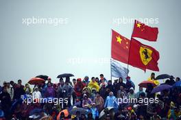 Fans and flags. 19.04.2014. Formula 1 World Championship, Rd 4, Chinese Grand Prix, Shanghai, China, Qualifying Day.