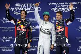 Qualifying top three in parc ferme (L to R): Daniel Ricciardo (AUS) Red Bull Racing, second; Lewis Hamilton (GBR) Mercedes AMG F1, pole position; Sebastian Vettel (GER) Red Bull Racing, third. 19.04.2014. Formula 1 World Championship, Rd 4, Chinese Grand Prix, Shanghai, China, Qualifying Day.