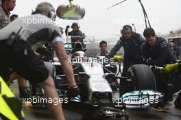 Lewis Hamilton (GBR) Mercedes AMG F1 W05 practices a pit stop. 19.04.2014. Formula 1 World Championship, Rd 4, Chinese Grand Prix, Shanghai, China, Qualifying Day.