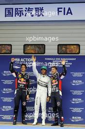 Qualifying top three in parc ferme (L to R): Daniel Ricciardo (AUS) Red Bull Racing, second; Lewis Hamilton (GBR) Mercedes AMG F1, pole position; Sebastian Vettel (GER) Red Bull Racing, third. 19.04.2014. Formula 1 World Championship, Rd 4, Chinese Grand Prix, Shanghai, China, Qualifying Day.