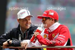 Valtteri Bottas (FIN), Williams F1 Team and Kimi Raikkonen (FIN), Scuderia Ferrari  20.04.2014. Formula 1 World Championship, Rd 4, Chinese Grand Prix, Shanghai, China, Race Day.