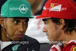 Lewis Hamilton (GBR), Mercedes AMG F1 Team and Fernando Alonso (ESP), Scuderia Ferrari at the press conference 17.04.2014. Formula 1 World Championship, Rd 4, Chinese Grand Prix, Shanghai, China, Preparation Day.