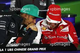 (L to R): Lewis Hamilton (GBR) Mercedes AMG F1 and Fernando Alonso (ESP) Ferrari in the FIA Press Conference. 17.04.2014. Formula 1 World Championship, Rd 4, Chinese Grand Prix, Shanghai, China, Preparation Day.