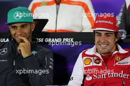 Lewis Hamilton (GBR), Mercedes AMG F1 Team and Fernando Alonso (ESP), Scuderia Ferrari at the press conference 17.04.2014. Formula 1 World Championship, Rd 4, Chinese Grand Prix, Shanghai, China, Preparation Day.